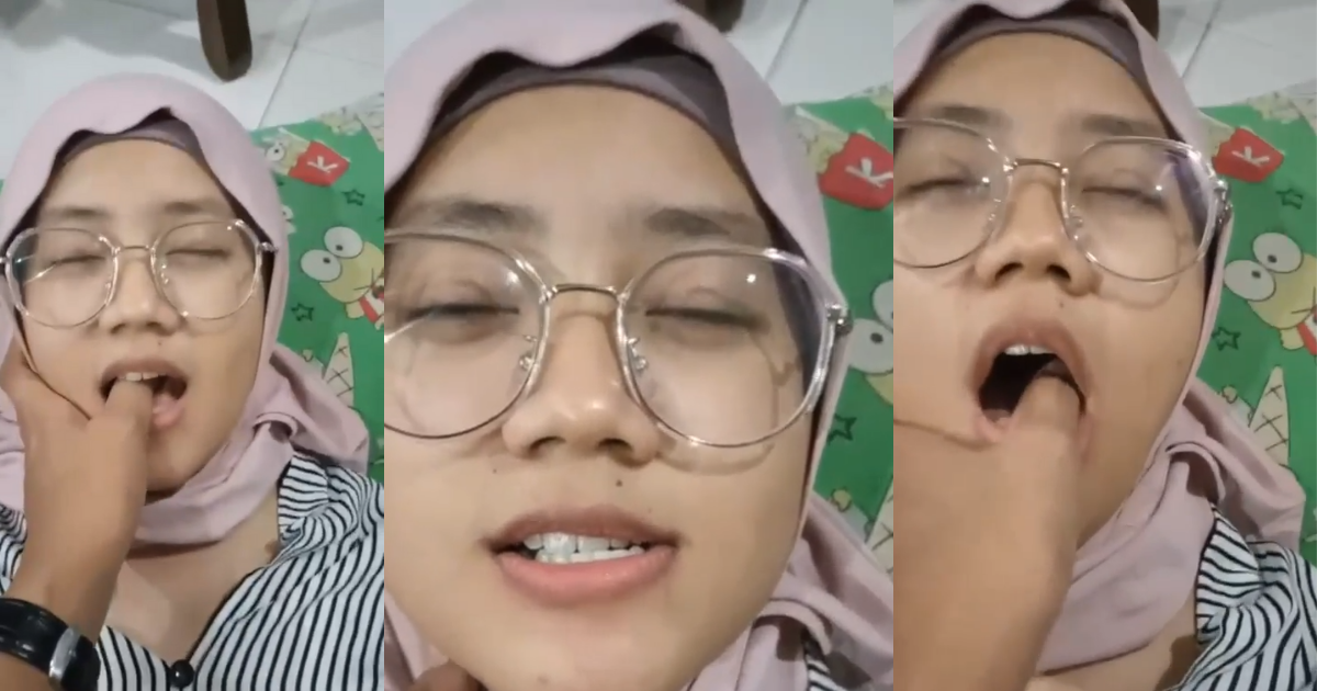 Seductive Hijabi Teases with Playful Facial Expressions
